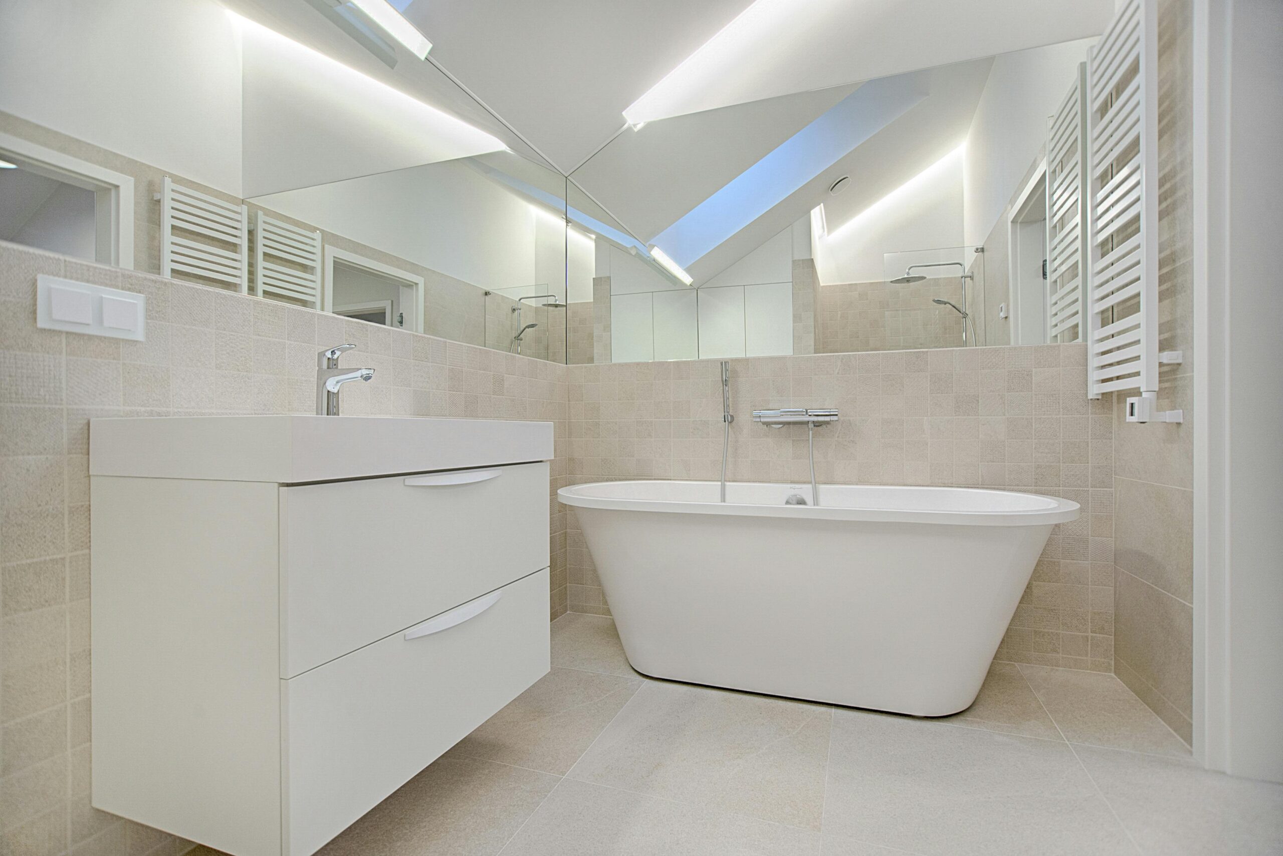 pexels photo 1571461 1571461 Elegant minimalist bathroom featuring a white bathtub and sleek fixtures.