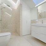 Bright and luxurious bathroom with contemporary fixtures and sleek design.
